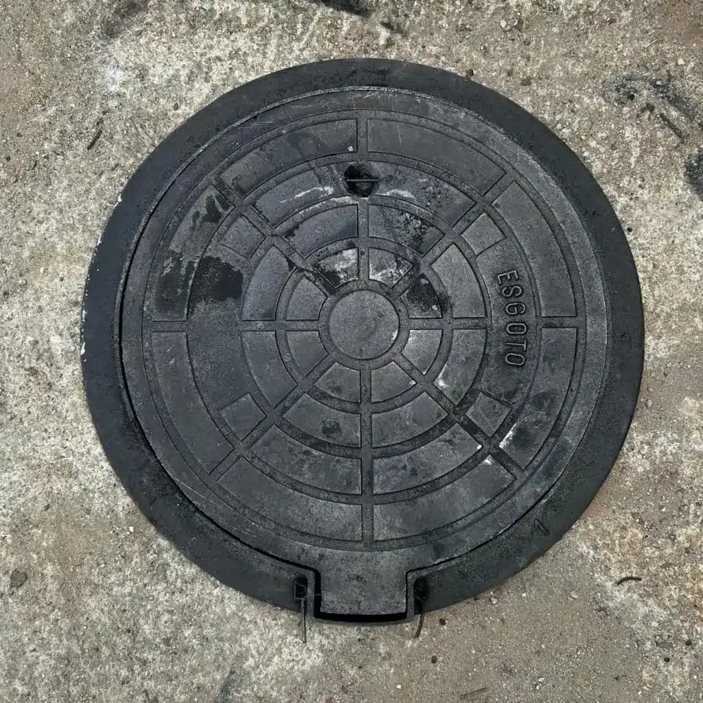 tampa de ferro fundido